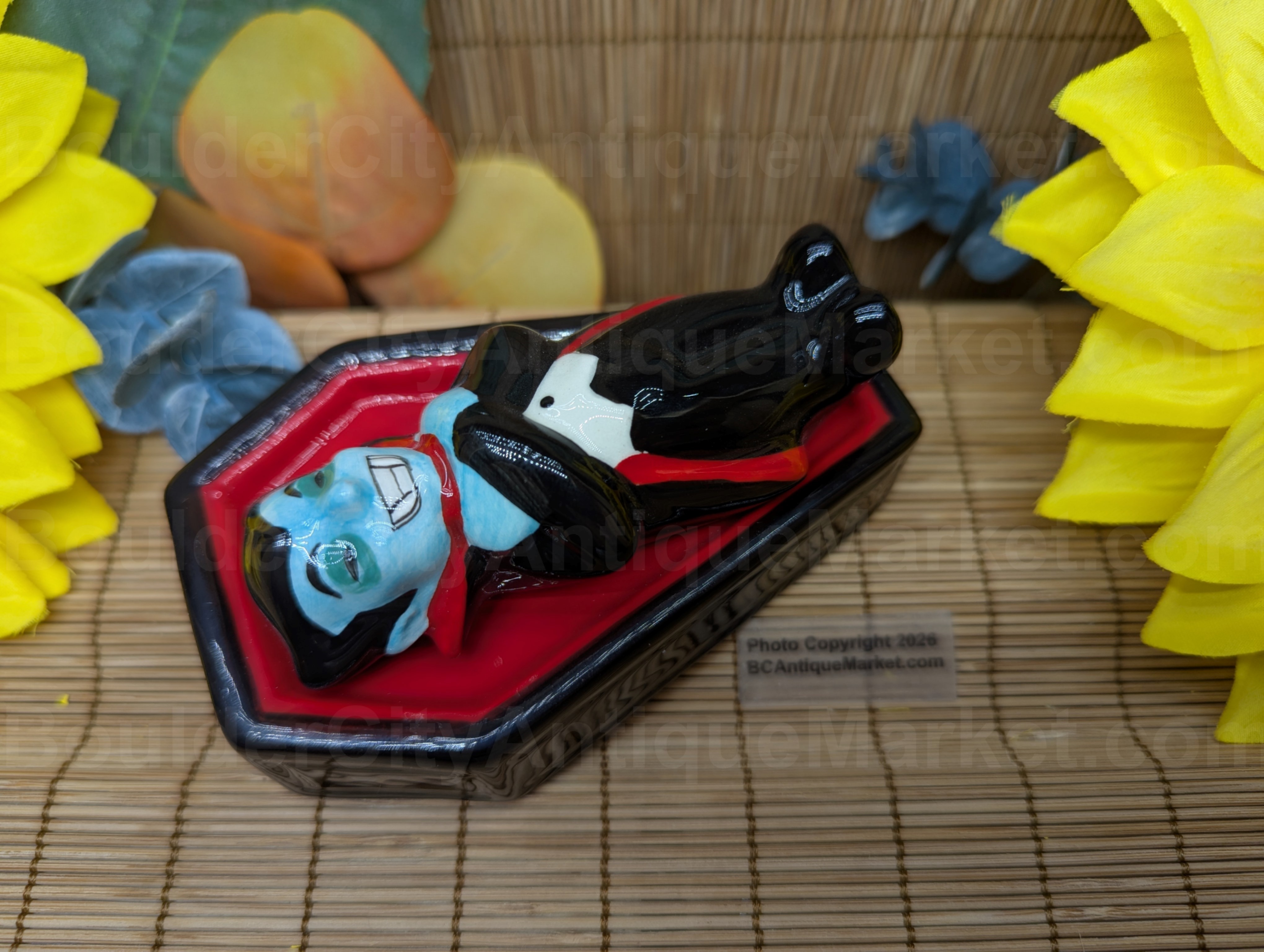 Super cute vampire and his coffin salt and pepper set. Vampire is 3 3/8 inches by 1 inch, coffin is 4 inches by 1 inch. This set is new.